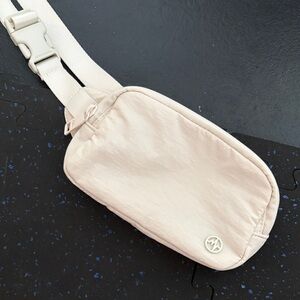 Cream Belt Bag with Logo